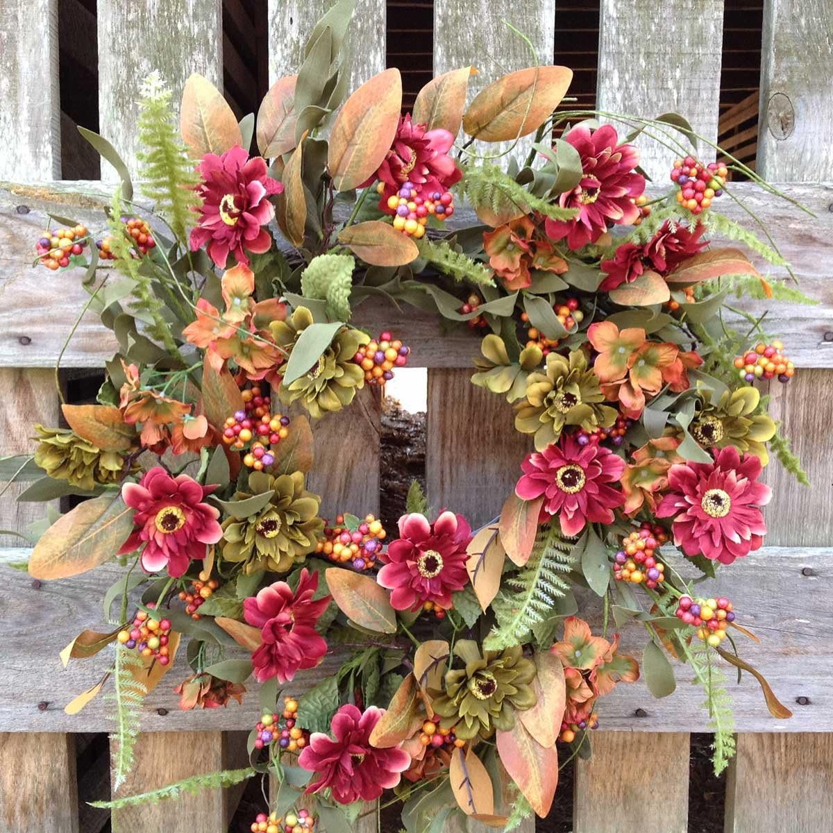 Gerber Daisy Garden Wreath 22-24", Handcrafted on a Sturdy Grapevine Base packed full of Green and Burgundy Gerber Daisies. Great Spring of Fall Wreath that can be used all the way up to Thanksgiving.