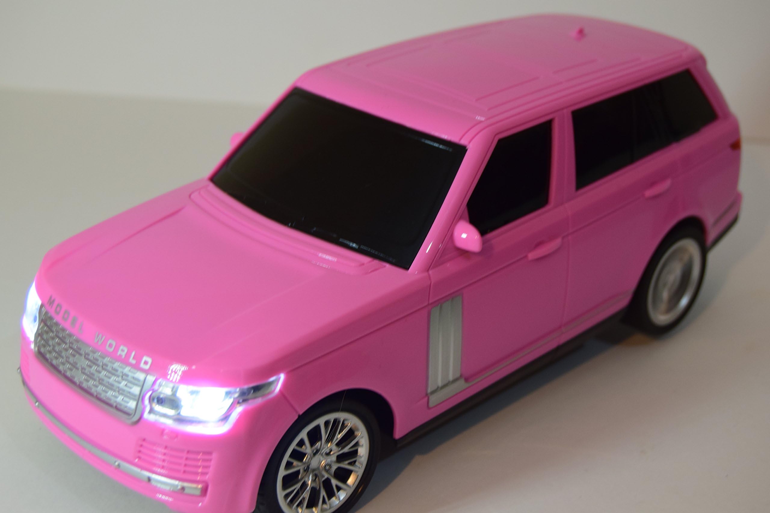 CELEBRITY SPORTS PINK RADIO REMOTE CONTROL CAR GIRLS SPORTS CAR 1/16 HEADLIGHTS