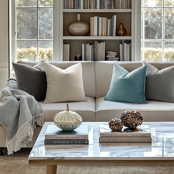 The MIULEE velvet pillow covers add a touch of plush elegance to a modern living space.