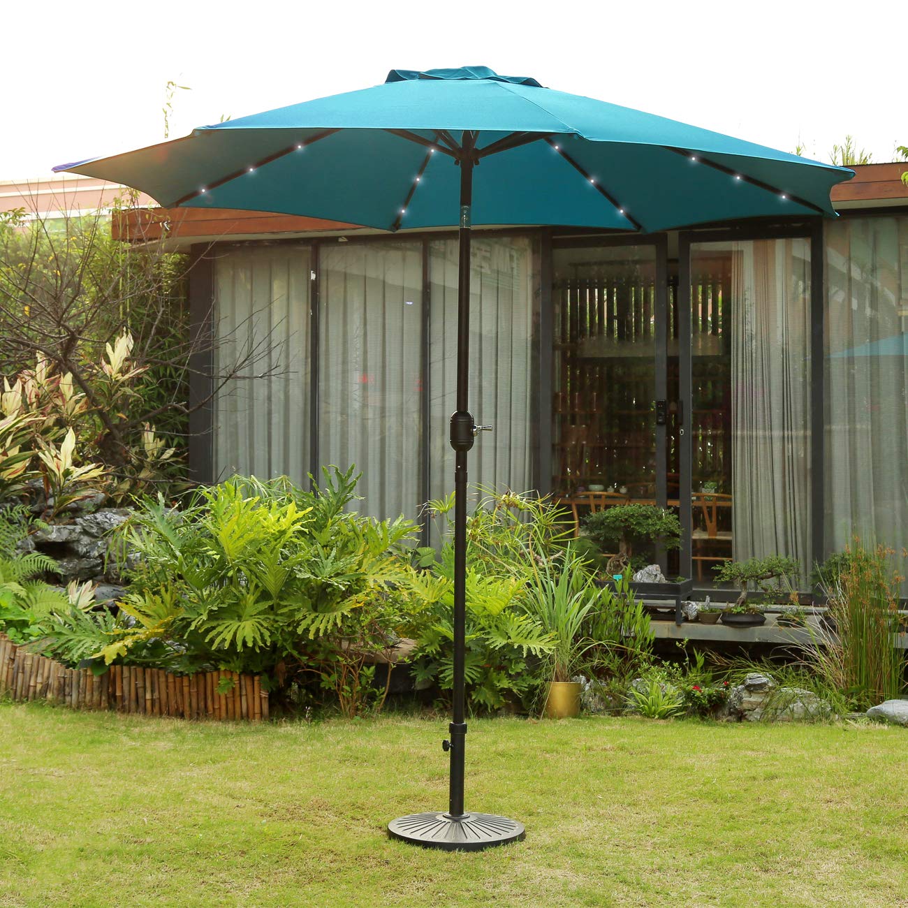 Amazon Com Sunnyglade 9 Solar 24 Led Lighted Patio Umbrella With 8 Ribs Tilt Adjustment And Crank Lift System Teal Blue Garden Outdoor