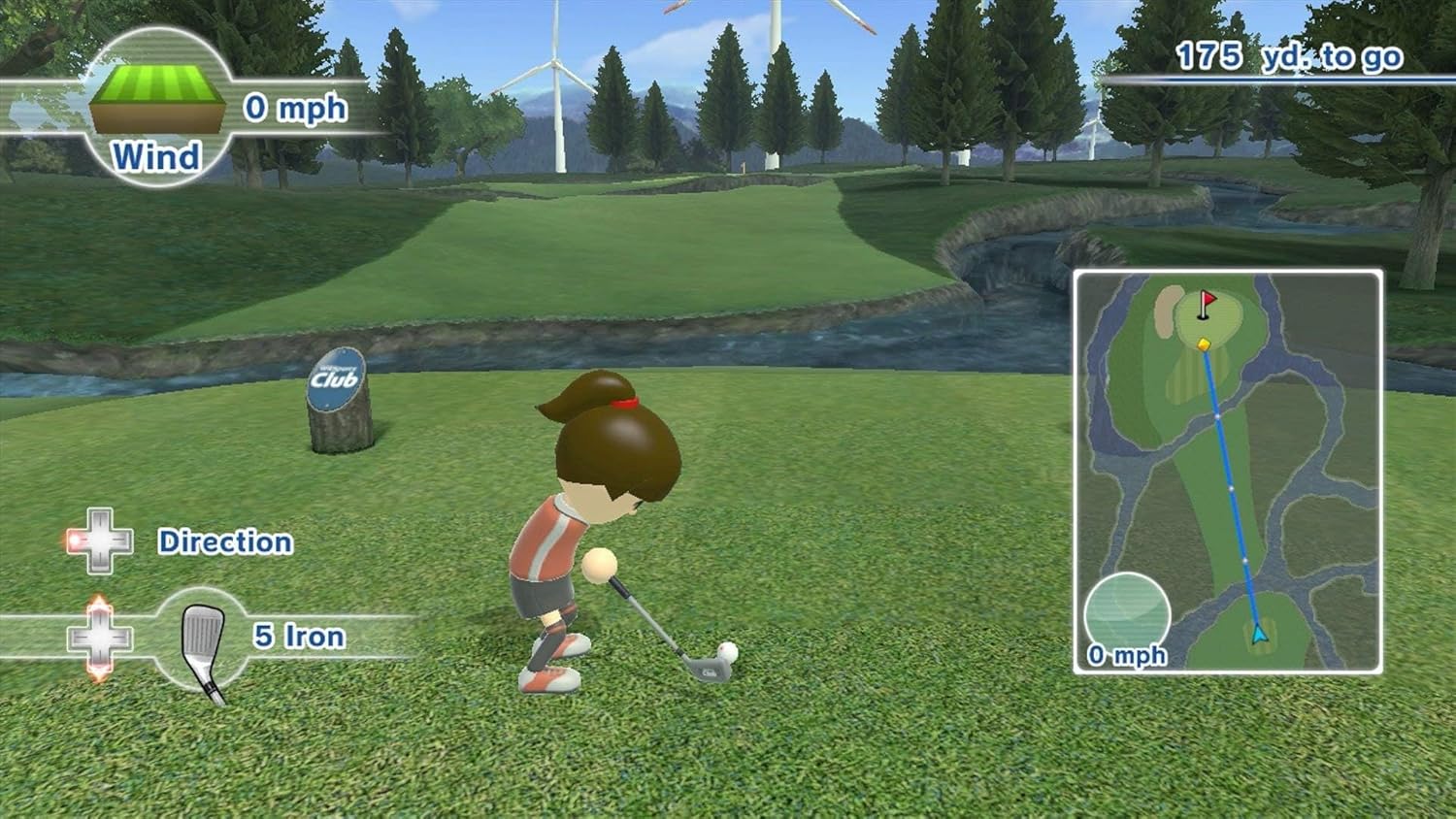 Wii Sports Club Golf gameplay showing a Mii character preparing to hit a golf ball on a green course.