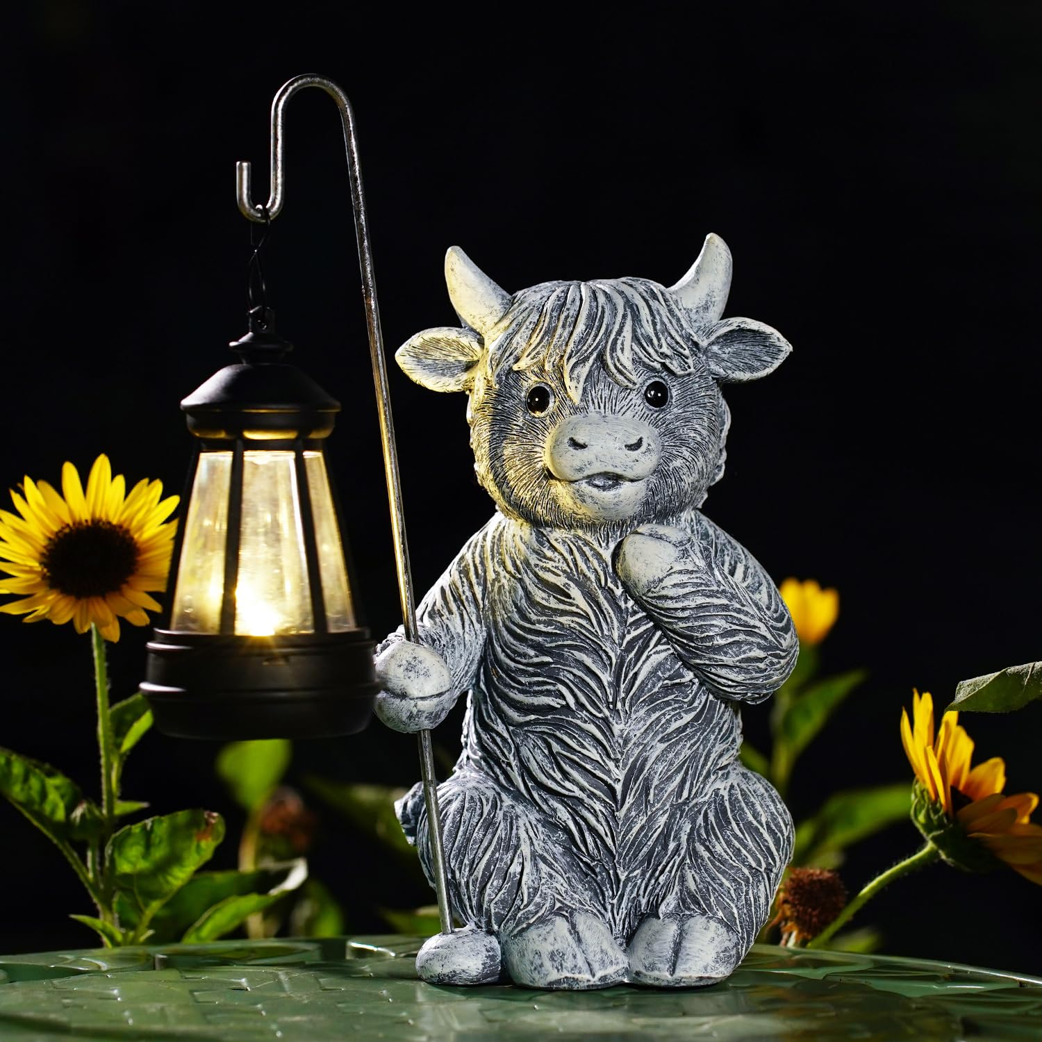 Goodeco Solar-Powered Grey Highland Cow Garden Ornament with Detachable Lantern, Adorable Sitting Calf Holding Metal Rod