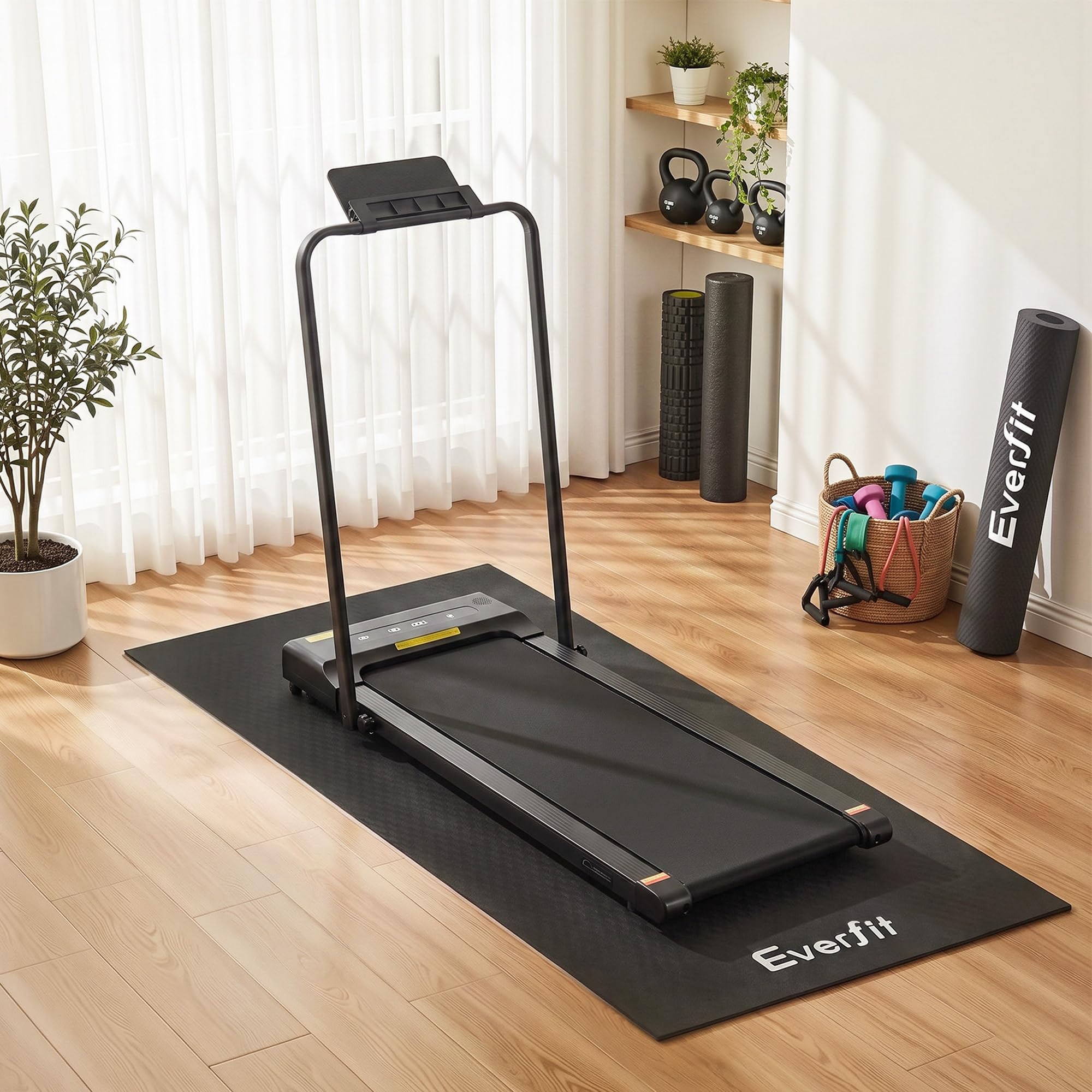 Everfit exercise equipment mat under a treadmill in a home gym