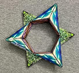 A green-blue Shashibo cube unfolded into a large star