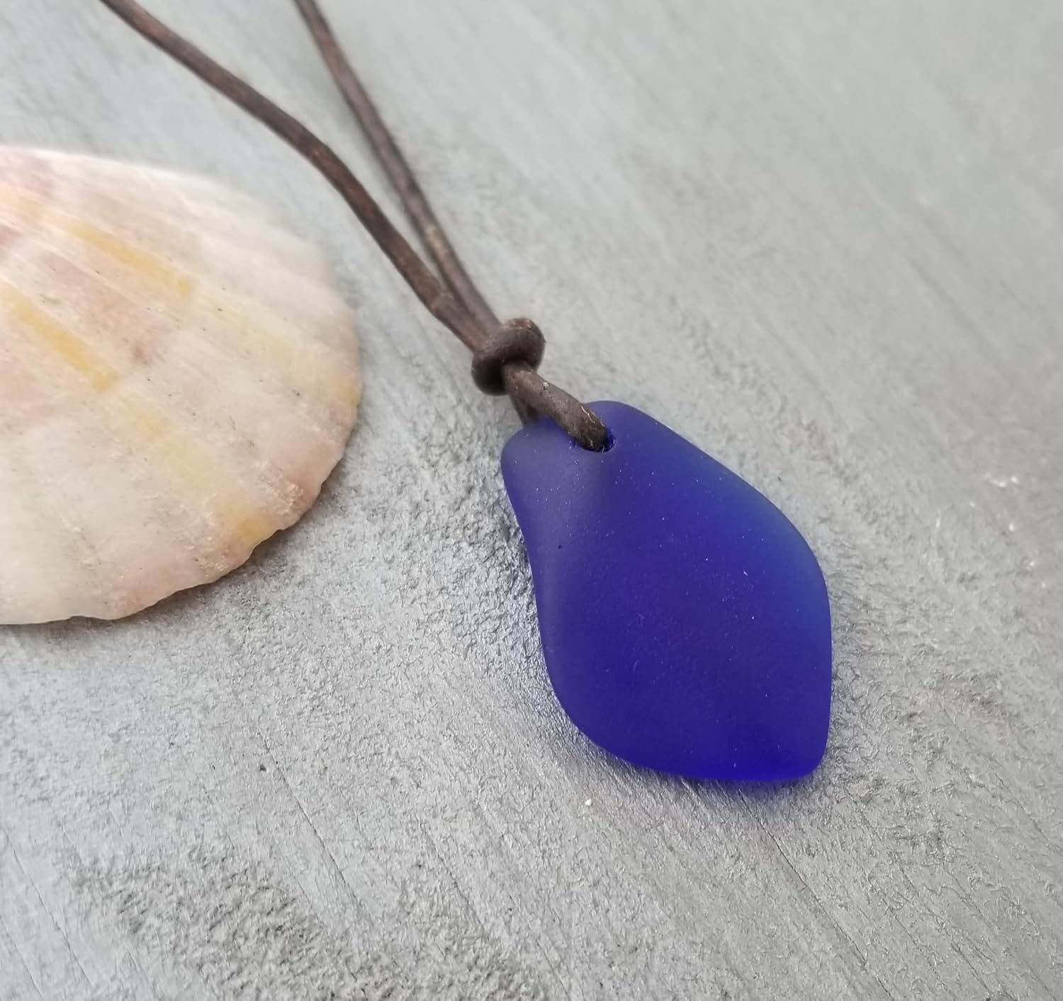 yinahawaii Handmade leather cord puff Cobalt Blue sea glass necklace, September Birthstone, unisex jewelry, (Hawaii Gift Wrapped, Customizable Gift Message)