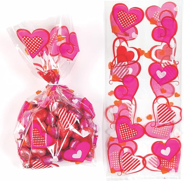 Baker Ross AC672 Heart Cellophane Gift Bags with Twist Ties for Children - Perfect Valentines Day Party Bag Filler or Gift for Kids (Pack of 20), Clear,Pink,Orange