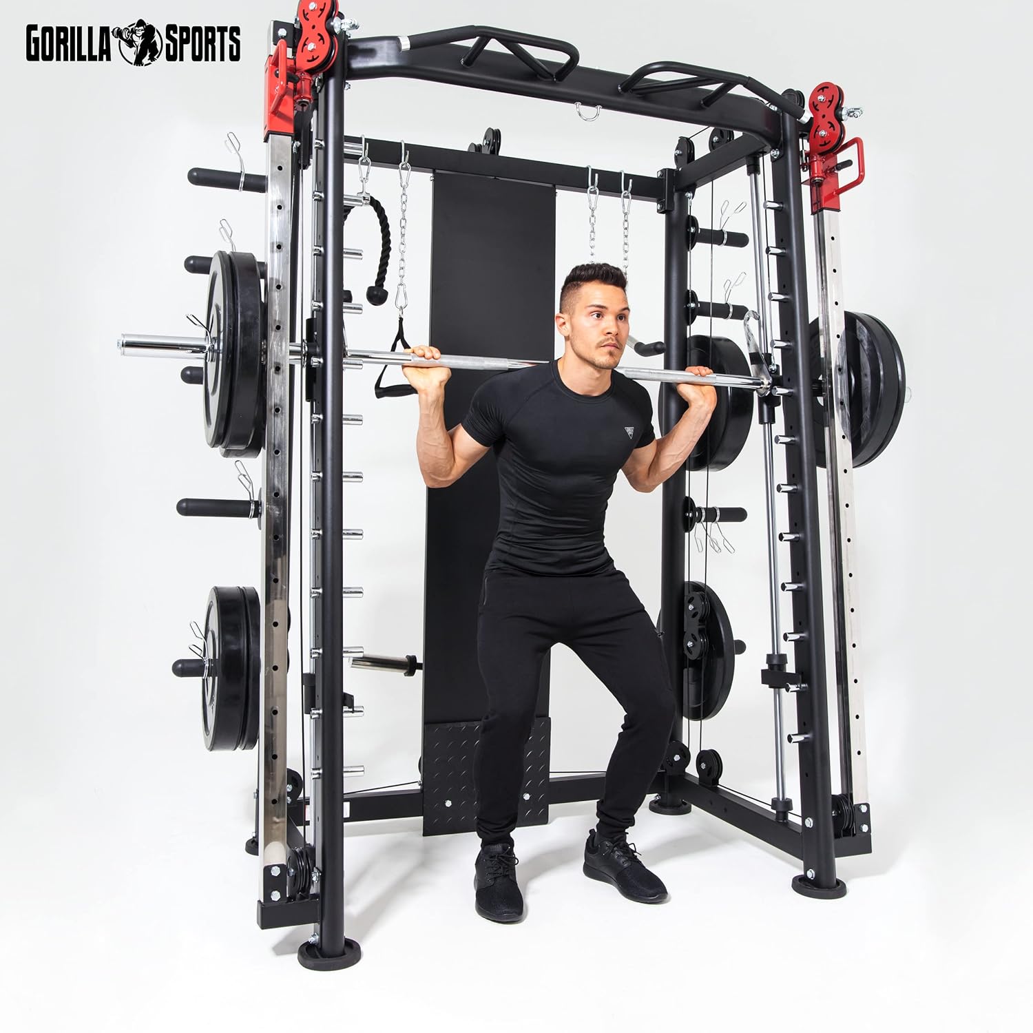 User performing squats with the guided barbell on the GORILLA SPORTS Power Cage