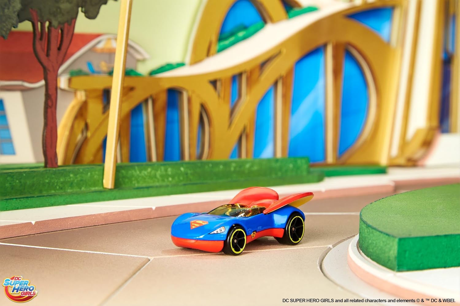Hot Wheels DC Super Hero Girls Supergirl Character Car from a side angle