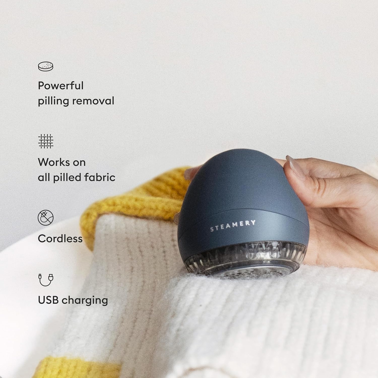 Steamery Fabric Shaver Pilo 1 in use on fabric