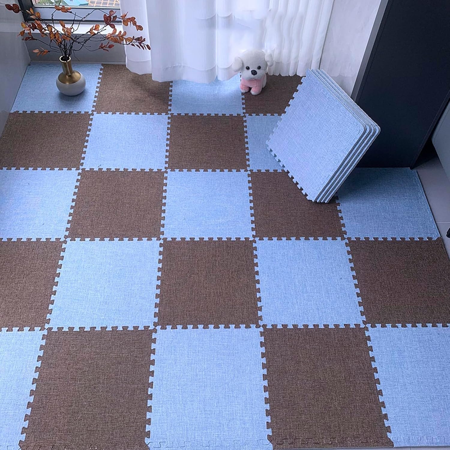 Alfombrilla de espuma para suelos fríos que amortigua caídas en el cuarto del bebé