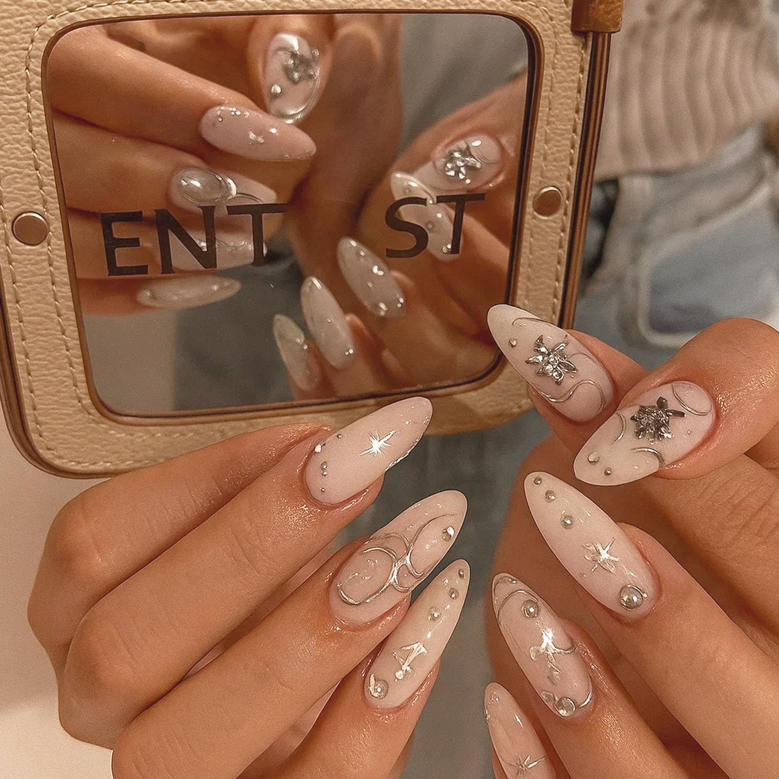 Glossy Elongated Stiletto False Nails With Intricate Silver Detailing And Sparkling Rhinestones - Image 4