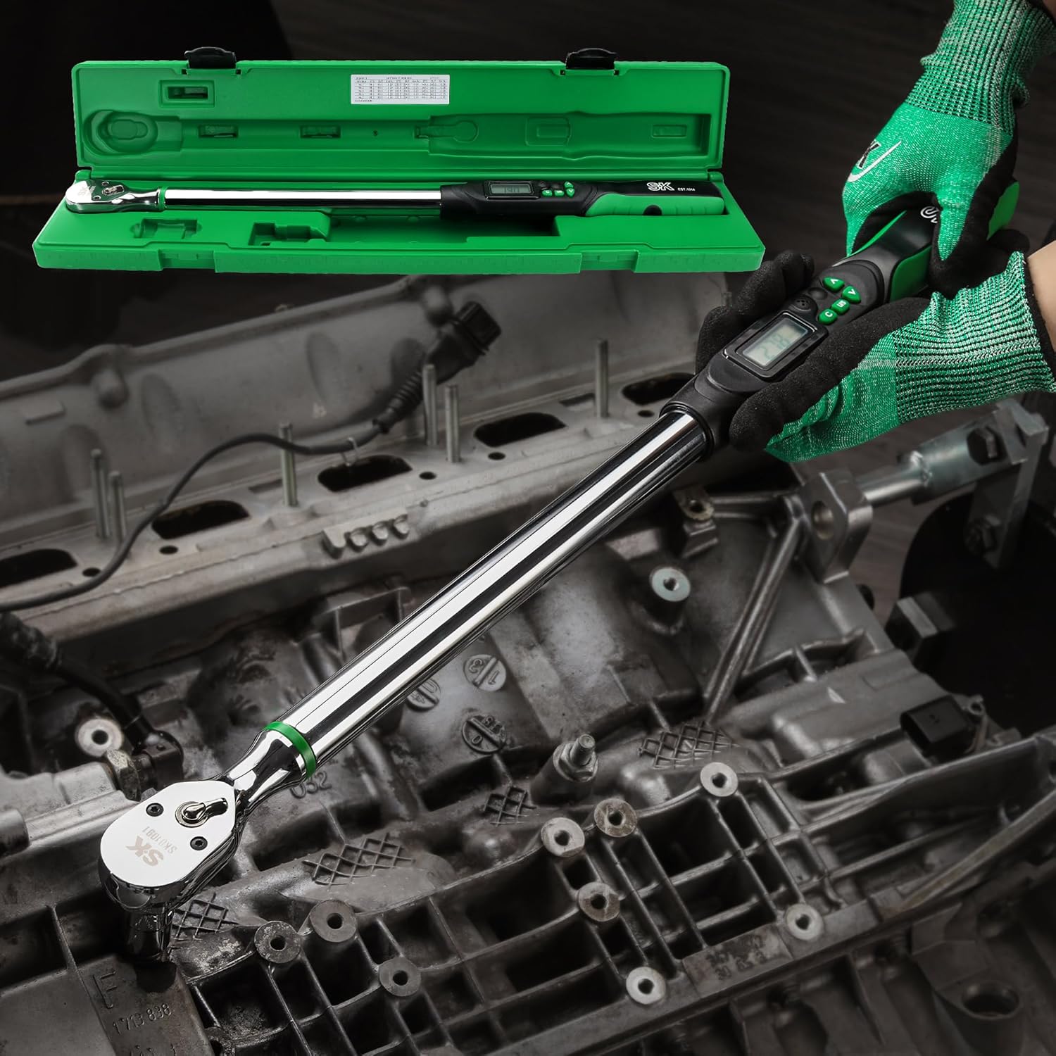A person using the SK Digital Torque Wrench to tighten a bolt on an engine component.