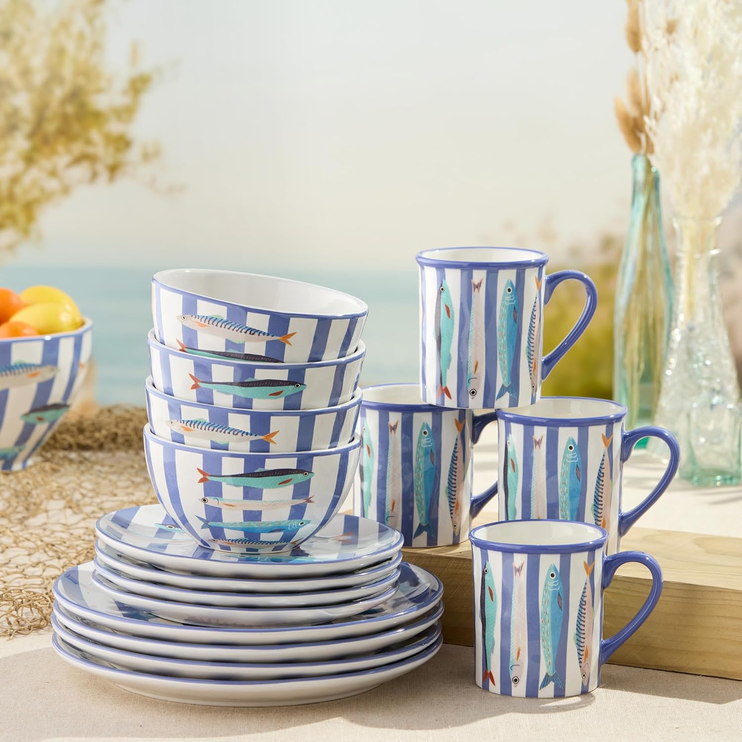 Something Fishy 16-Piece Ceramic DINNERWARE SET,SERVICE for 4, Coastal Blue Striped Plates, Mugs and Bowls with Artist-Designed Fish Artwork for Beach House Dining and Entertaining