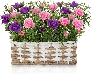 Pink and purple artificial roses in a woven-look basket