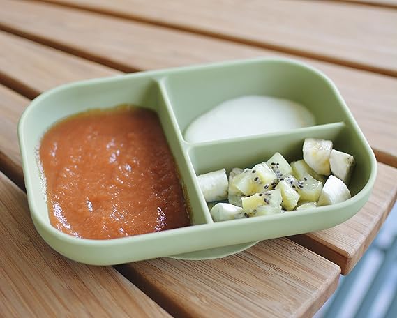 Available in a charming sage color, the Beaba Silicone Suction Divided Plate is both stylish and safe for your child, as it is free from harmful substances. This plate is a fantastic addition to any feeding arsenal, providing a safe, reliable, and practical solution for meal times that both parents and little ones will appreciate.