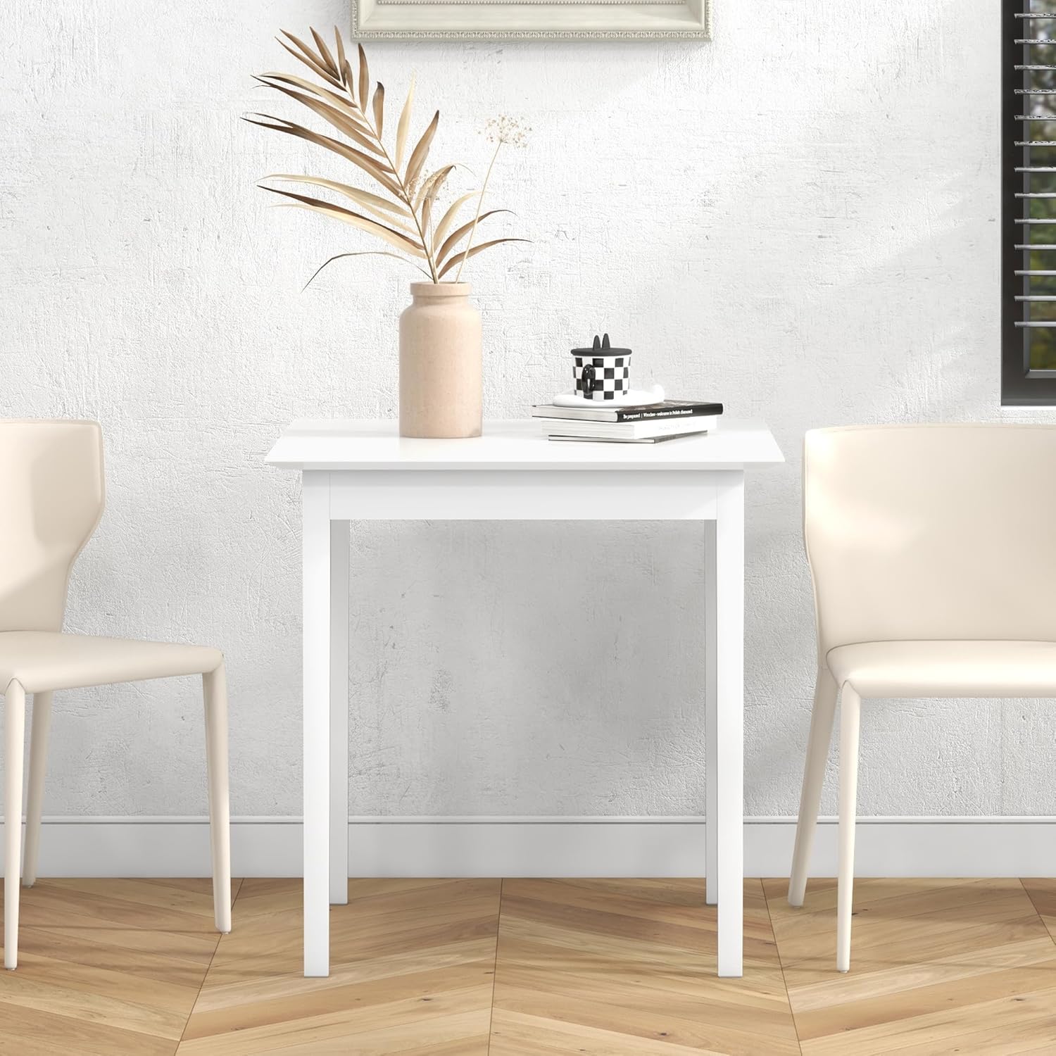 Close-up of the HOMCOM dining table leg showing wood structure and non-slip foot pad