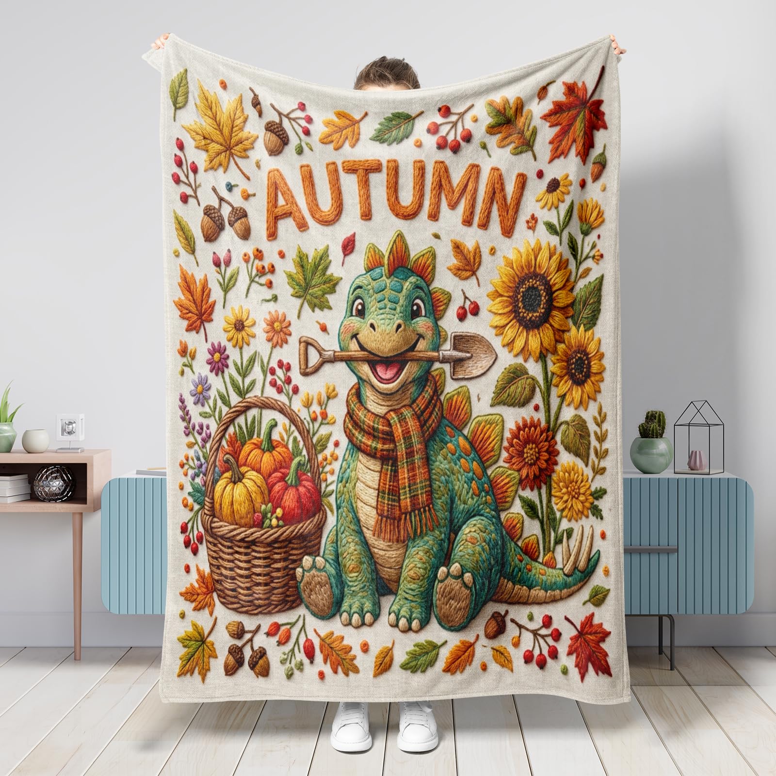 Couverture dinosaure d'automne pour un canapé cosy ou vos sorties camping