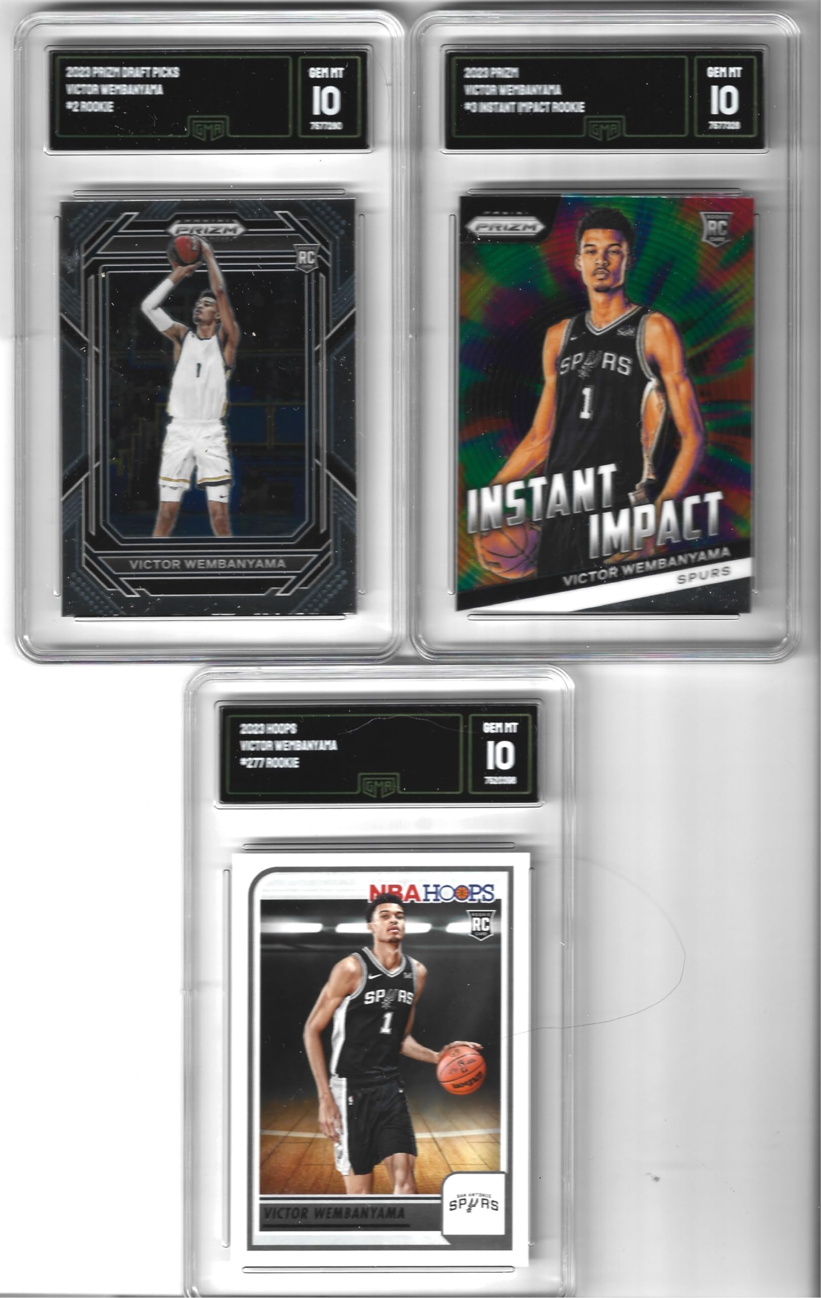 Amazon.com: GEM MINT VICTOR WEMBANYAMA 3 CARD ROOKIE LOT GRADED GMA GEM  MINT 10 PRZM, INSTANT IMPACT & HOOPS # 1 PICK SUPERSTAR : Collectibles &  Fine Art