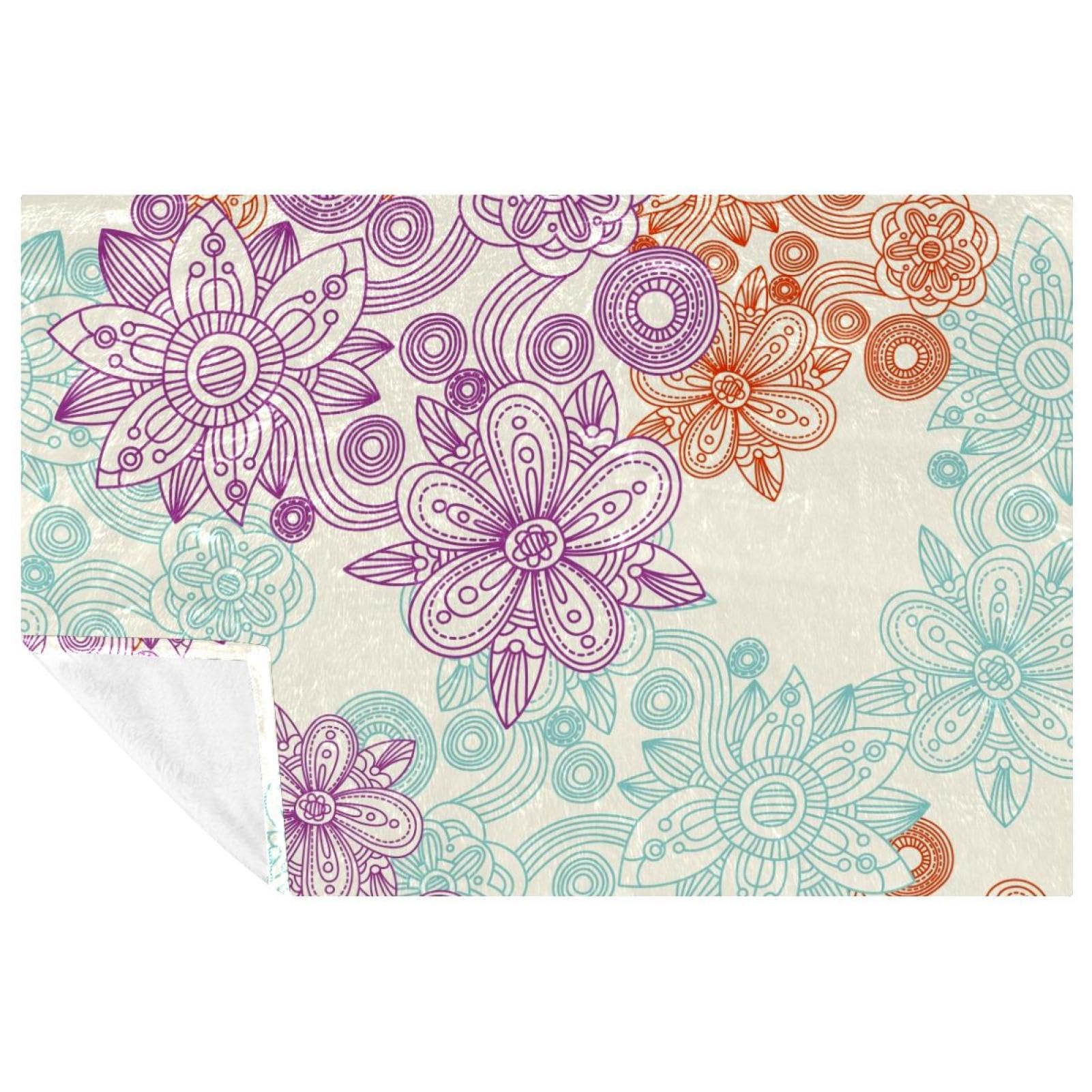 Couverture douce et chaude à fleurs pour réchauffer vos soirées et moments complices