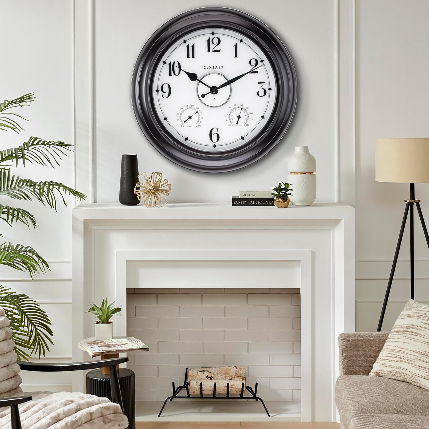 CLXEAST outdoor clock mounted above a fireplace mantel in a living room setting.