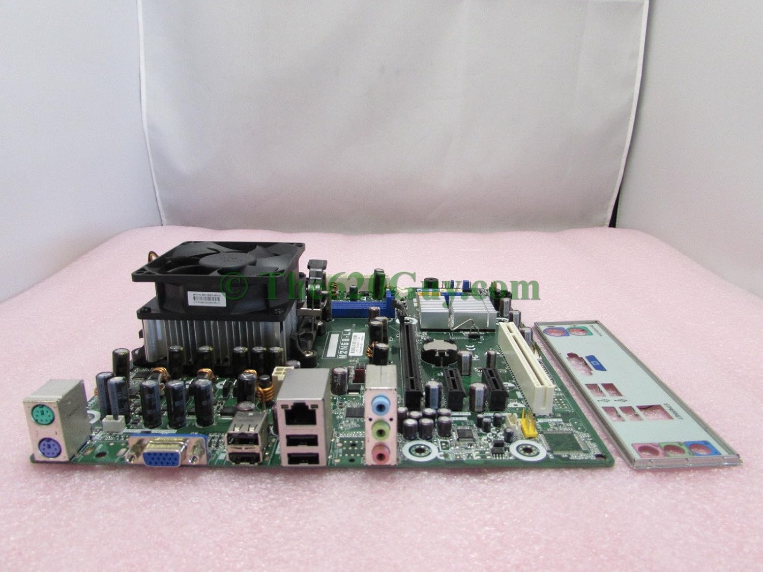 جانب view of the HP Compaq 513426-001 Motherboard with CPU heatsink and fan