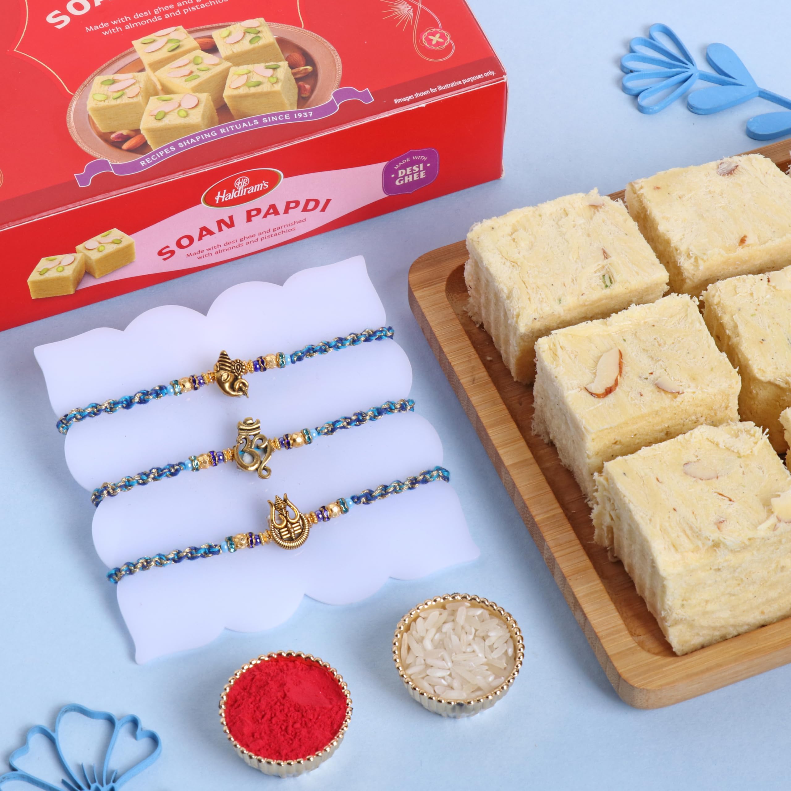 FlowerAura Raksha Bandhan Celebrations Set Of 3 Divine Rakhi With 250g Soan Papdi - Rakhi for Brother, Bhai, Cousins & Raksha Bandhan Gift (Same Day Delivery) (B0D9C2THMF) Amazon Price History, Amazon Price Tracker