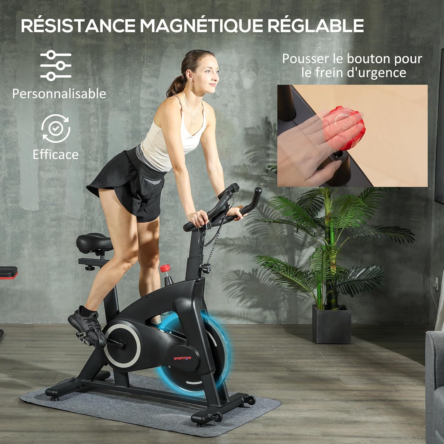 Woman on exercise bike, with an inset showing the emergency stop button and text indicating adjustable magnetic resistance.