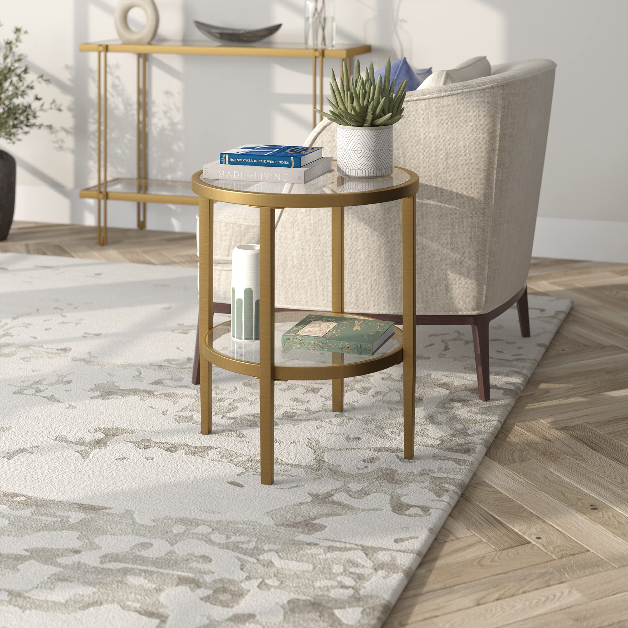 Henn&Hart 20" Wide Round Side Table with Glass Shelf in Antique Brass, Table for Living Room, Bedroom | Glass shelves add airy display space and modern glam style beside sofas, beds, or accent chairs