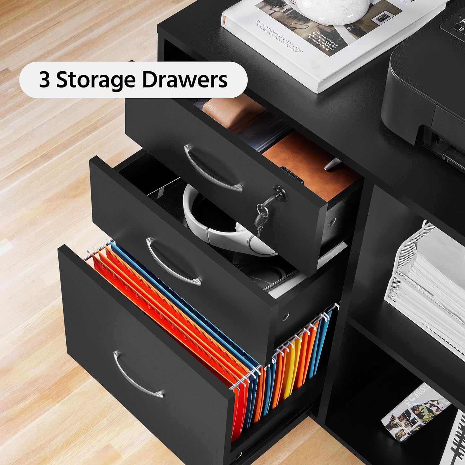 Kusa-up na file cabinet drawers, showing files organized within the bottom drawer.