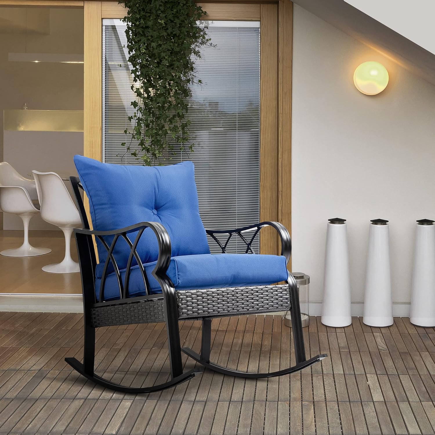 Outsunny Outdoor Wicker Rocking Chair with blue cushions on a patio