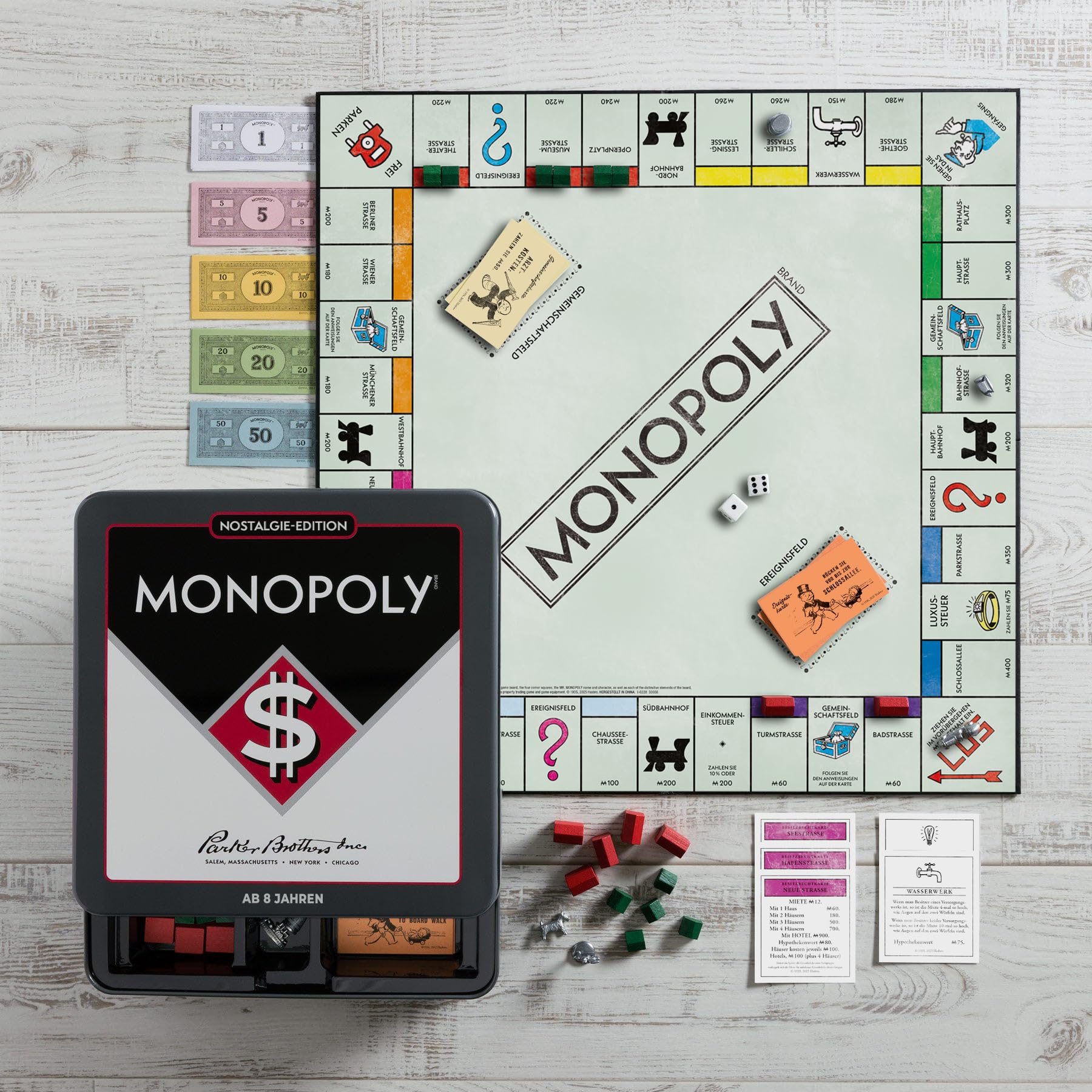 Monopoly Nostalgie Edition gra planszowa w stylu retro z lat 30., w wysokiej jakości puszce kolekcjonerskiej w stylu vintage z cyną figurkami, drewnianymi domkami, hotelami i dużą planszą do zabawy