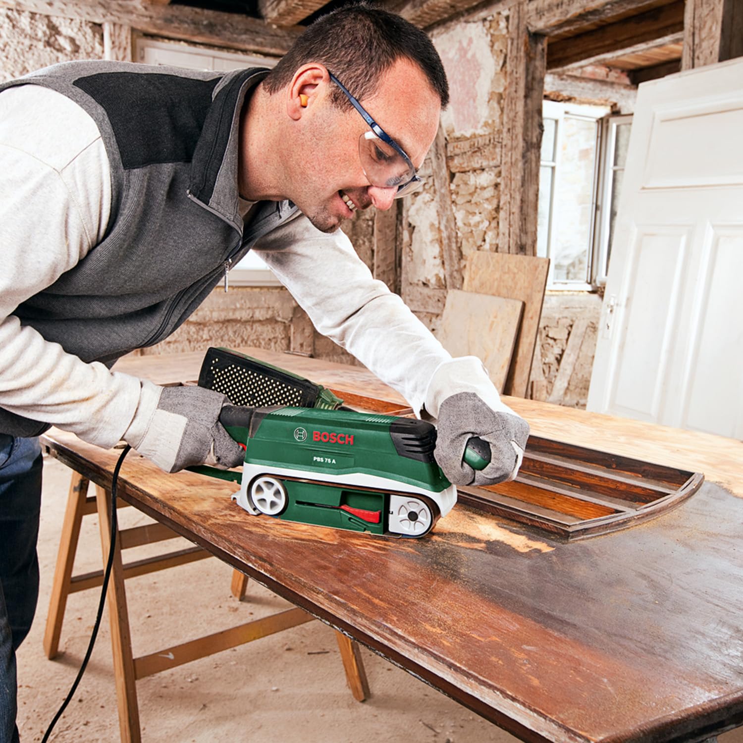 Bosch Ponceuse à bande PBS 75 A (710 W, surface de ponçage 76 x 165 mm, dimensions de la bande 75 x 533 mm, 1 bande abrasive K 80)