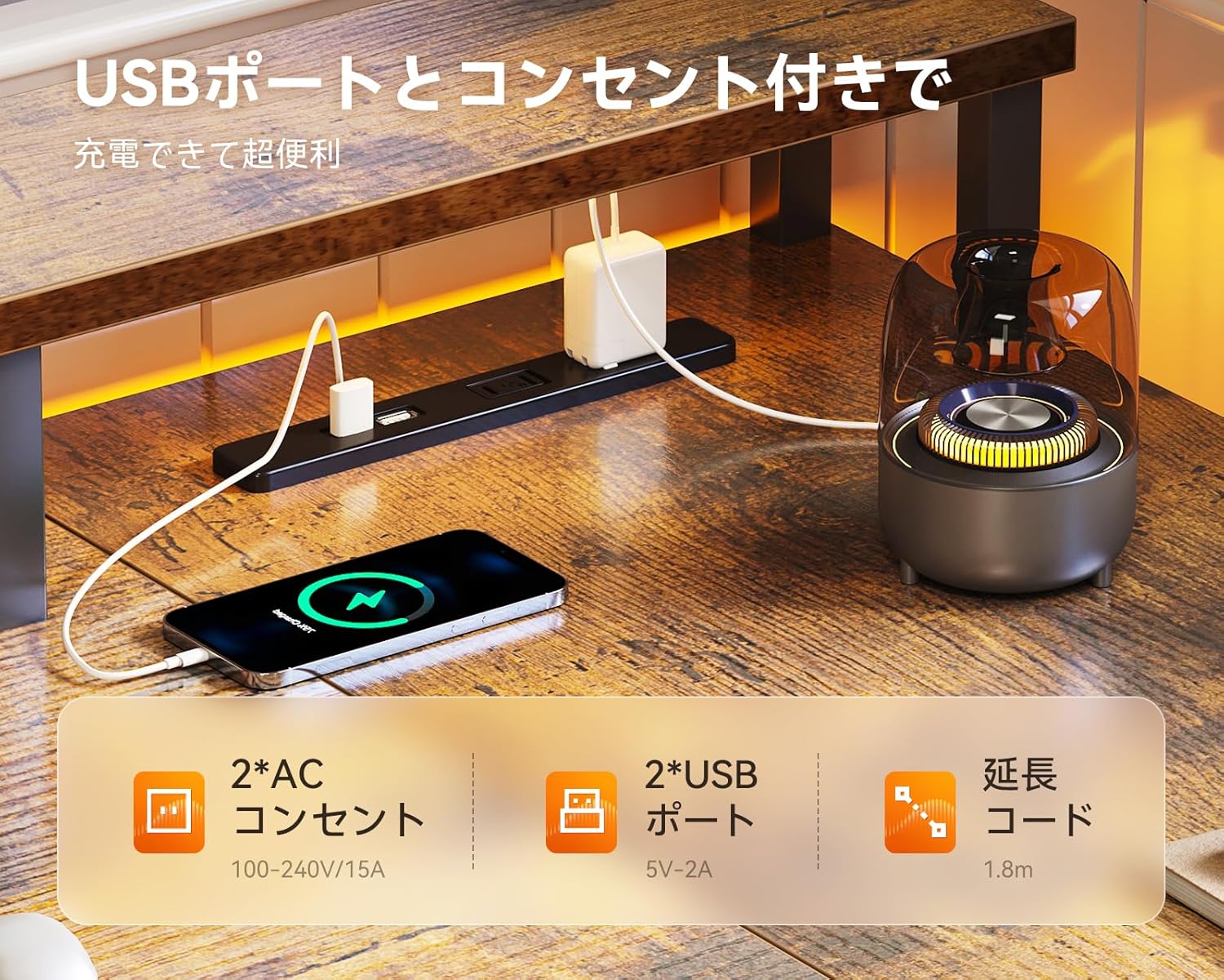 Smartphone charging via the desk's integrated USB port and AC outlet