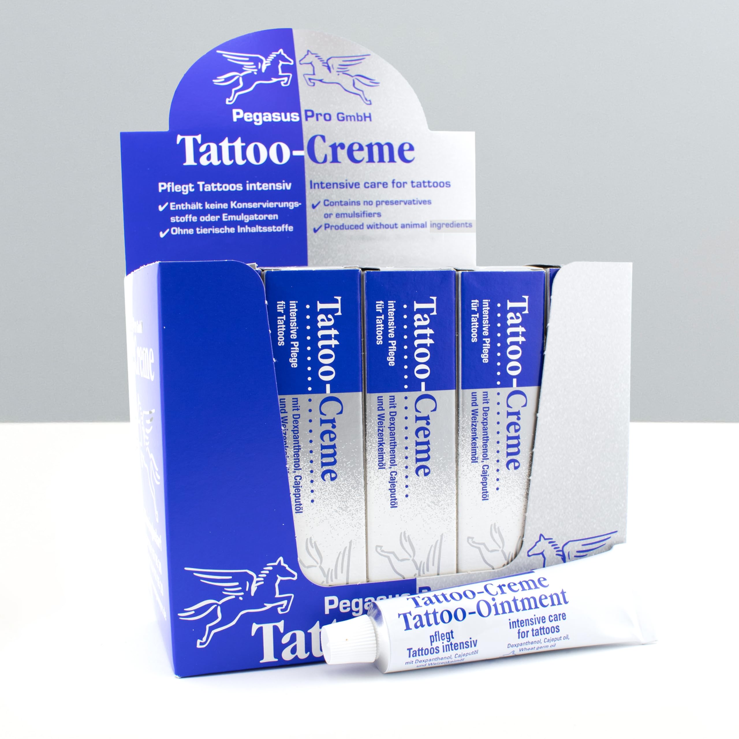 Pegasus Pro Crema para tatuajes, juego de 25 unidades en expositor de mostrador, 25 g, cuidado y cuidado posterior para una protección intensiva del tatuaje, hidratante con aceite de cajeput, aceite