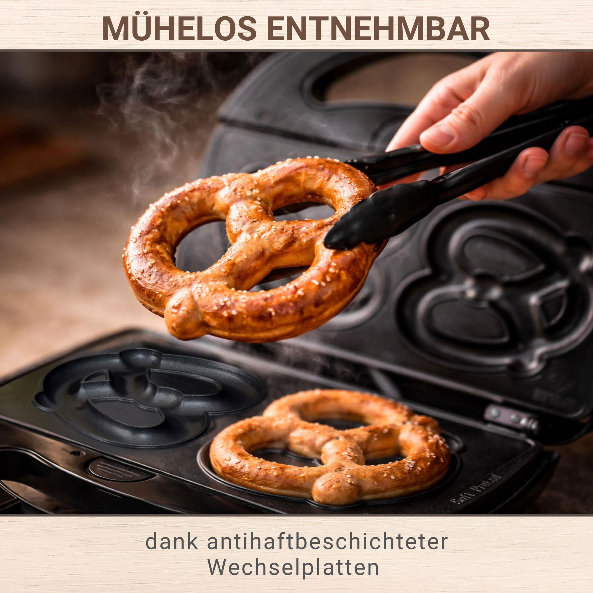 Syntrox Germany SM-1300W-Soft-Brezel Maker mit antihaftbeschichteten Wechselplatten für 2 große Brezeln