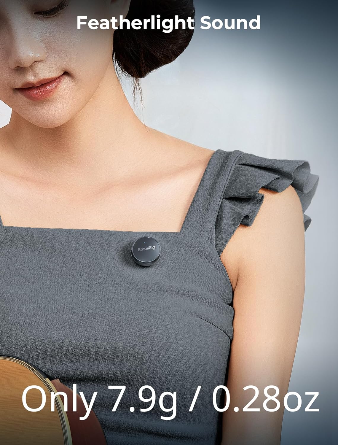 A person wearing the small SMALLRIG S60 microphone on their shirt, highlighting its featherlight design.