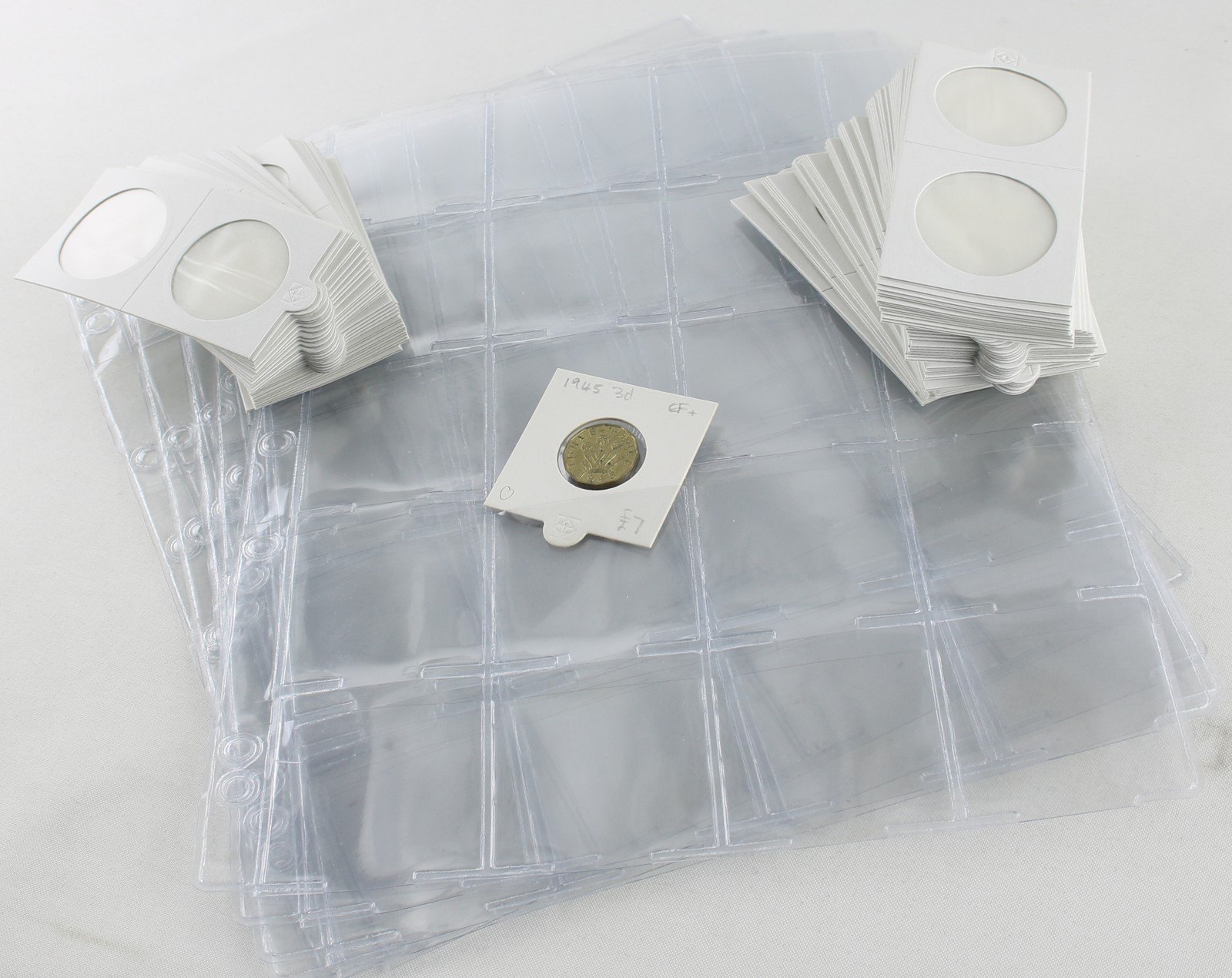 5 pages of coin album pages with 100 x self adhesive coin holders 30mm