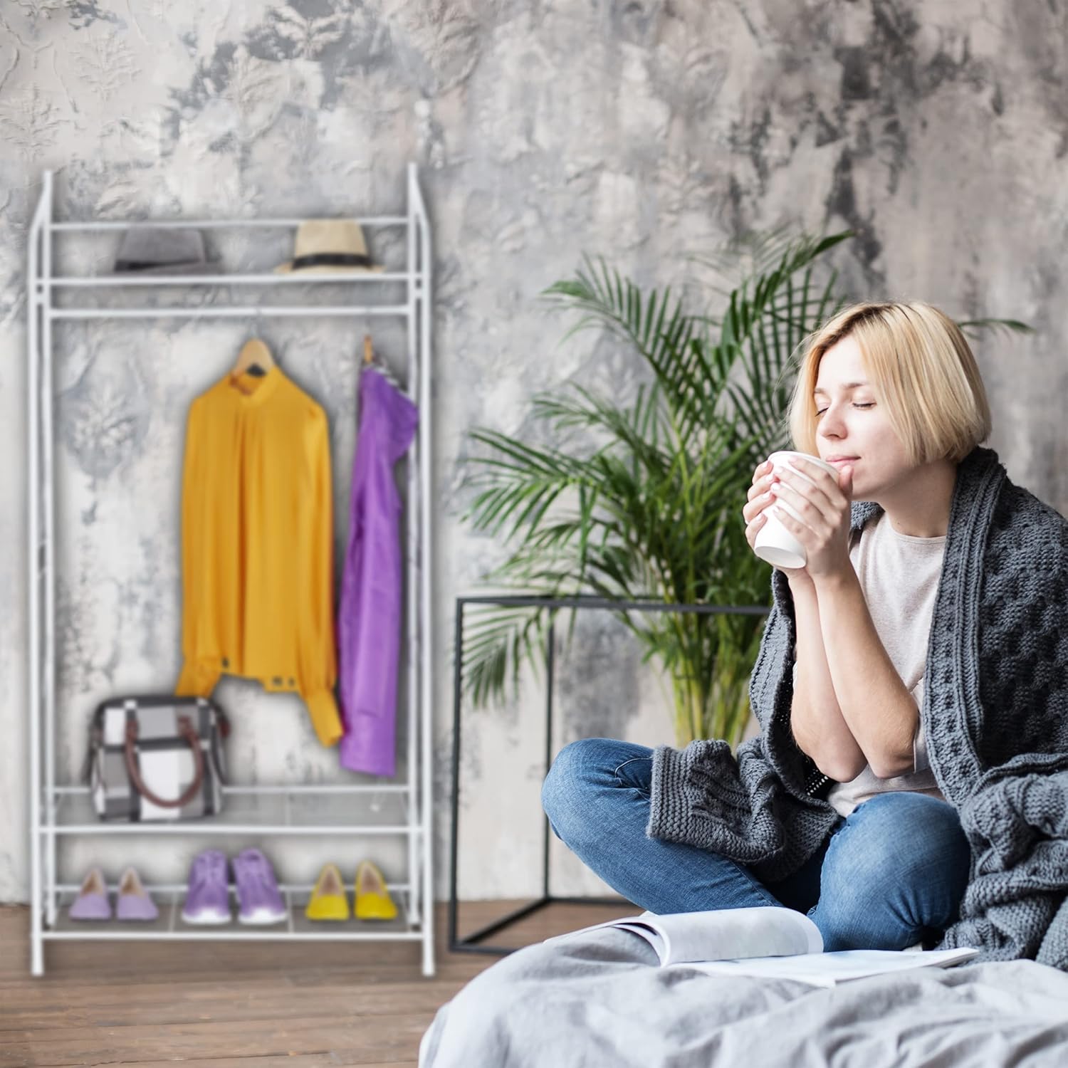 Relaxdays Coat Rack in a bedroom setting, holding clothes, hats, and shoes.
