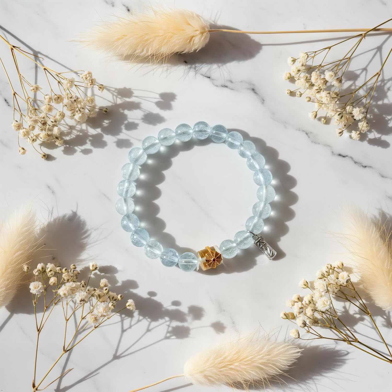 Aquamarine Beaded Bracelet with Gold Ruby Accent Bead and Silver Charm, Natural Blue Gemstone, Elastic Stretch