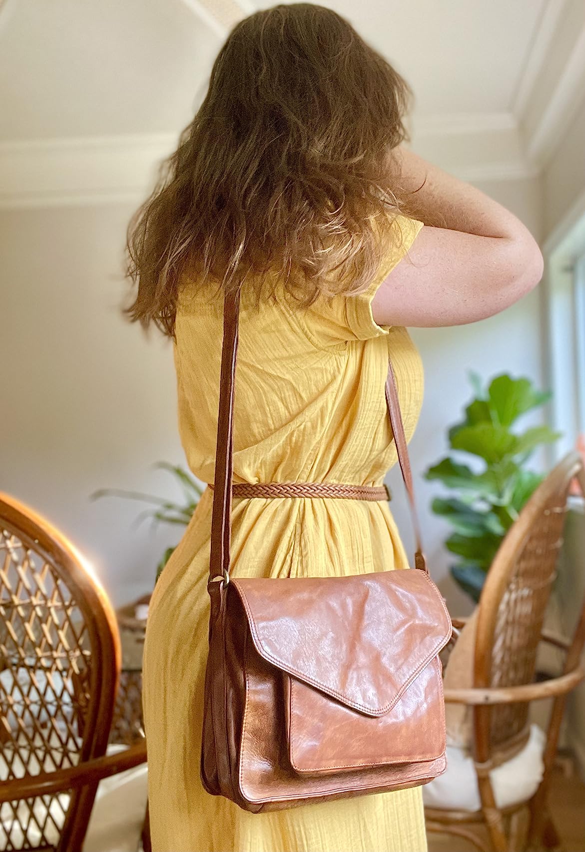 Crossbody bag styled with casual jeans outfit