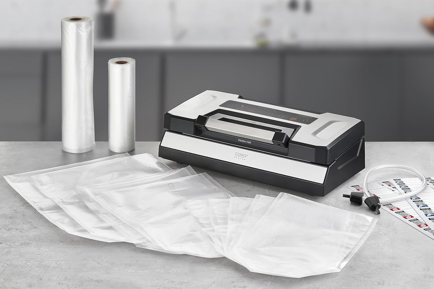 CASO VRH 790 advanced Pro Vacuum Sealer with included accessories: vacuum rolls, bags, and hose