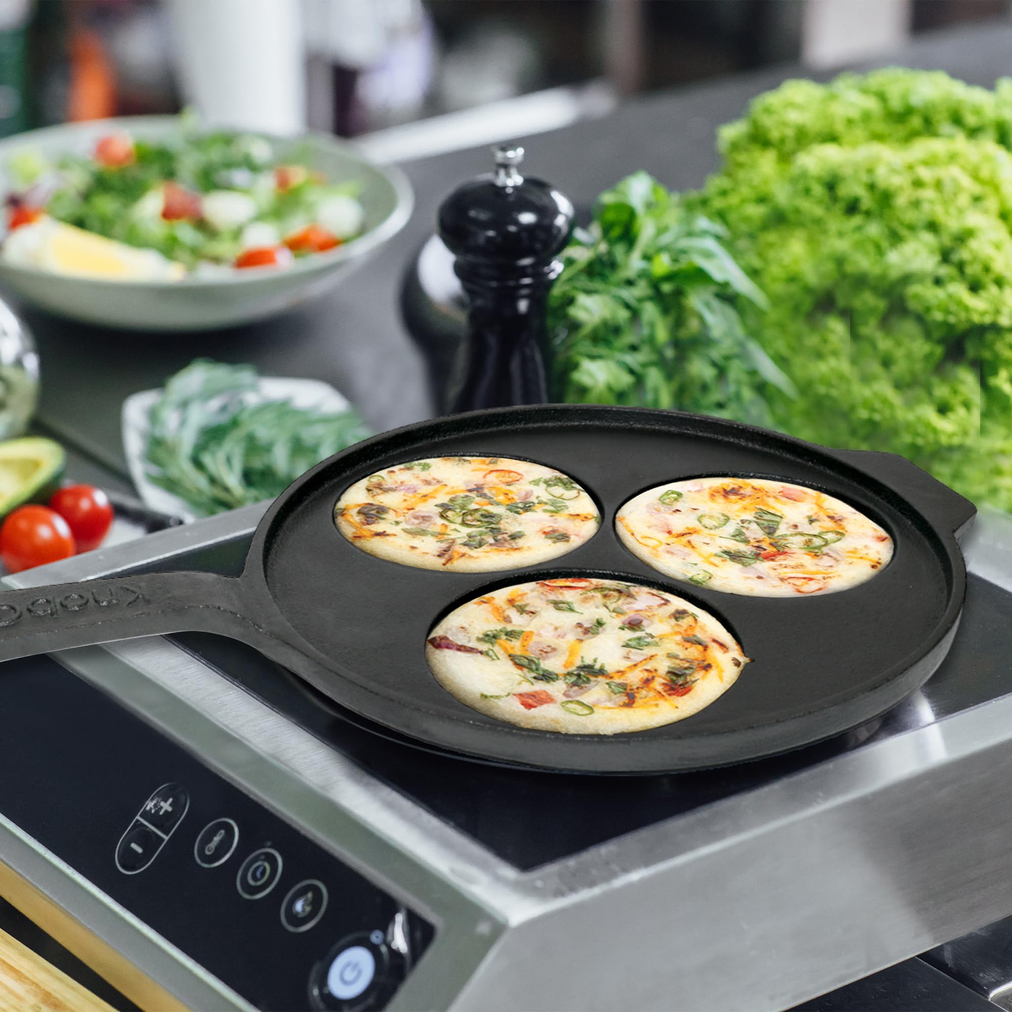 KNOBON Cast Iron Uttapam Tawa | pan Cake | Mini Uthappam Pan with 3 Cavities with Handle Iron Tawa Non-Stick Cookware | Gas and Induction Compatible | 26Cm | Black (B0CVDR44KD) Amazon Price History, Amazon Price Tracker