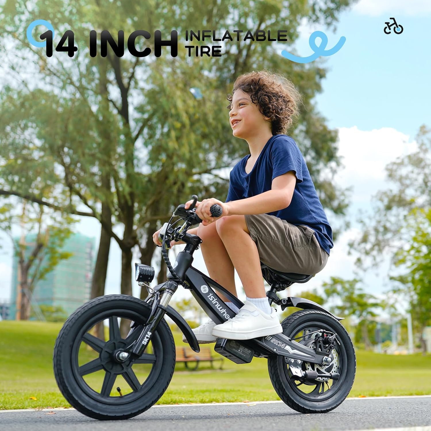 A young boy wearing a helmet, riding the black isinwheel SK14 electric bike on a paved path with trees in the background, highlighting the 14-inch inflatable tire.