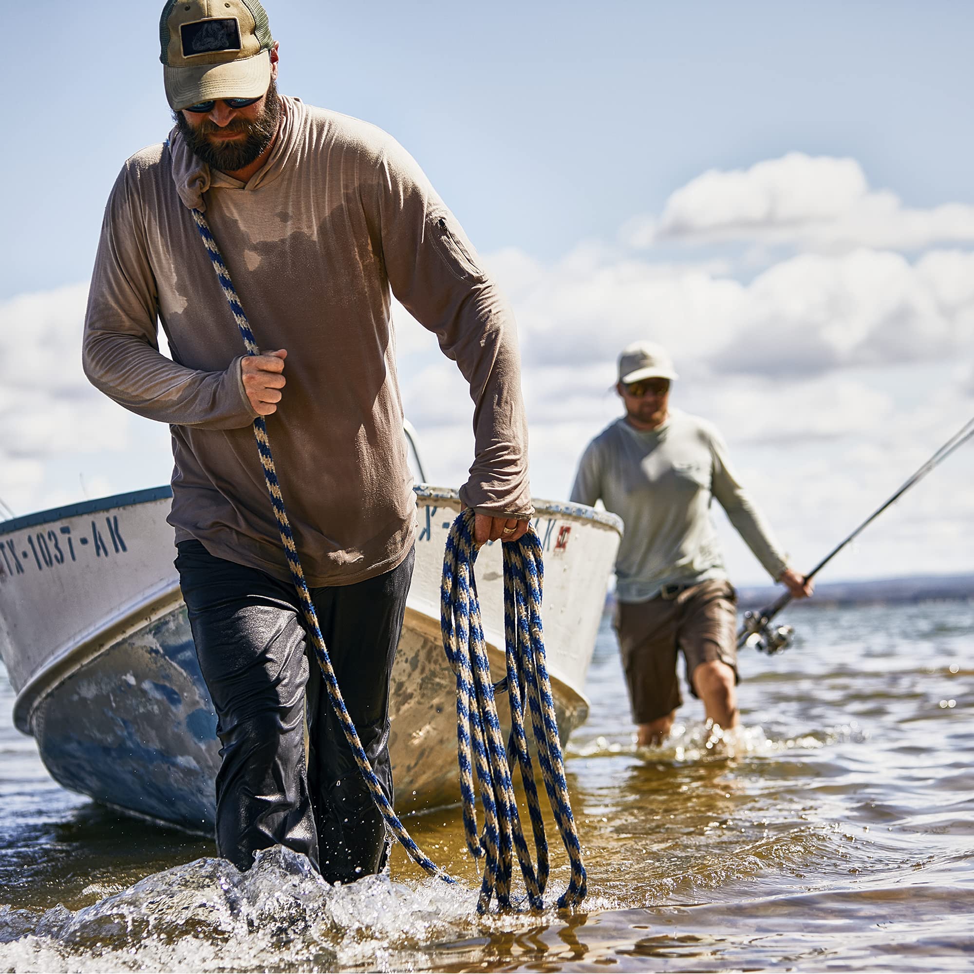 Quantum - Carrete de Pesca con Acelerador, rodamientos de Bolas 7 + 1 con una relación de Engranaje Suave y Potente 7.3:1, piñón de Cero fricción, Control de fundición DynaMag y pomos de Mango