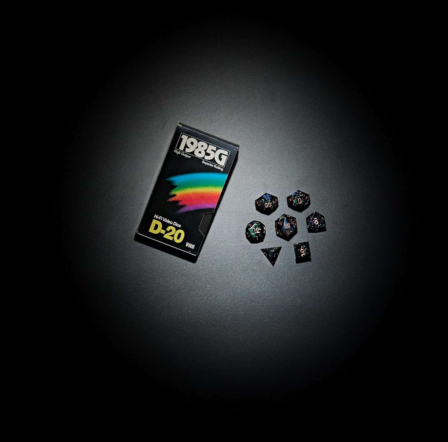 1985 Games Sharp Edge DND Dice Set – Starstorm Polyhedral Dice in Retro VHS Box – 5E TTRPG Dice Set – Tabletop RPG Accessory (Set of 7)
