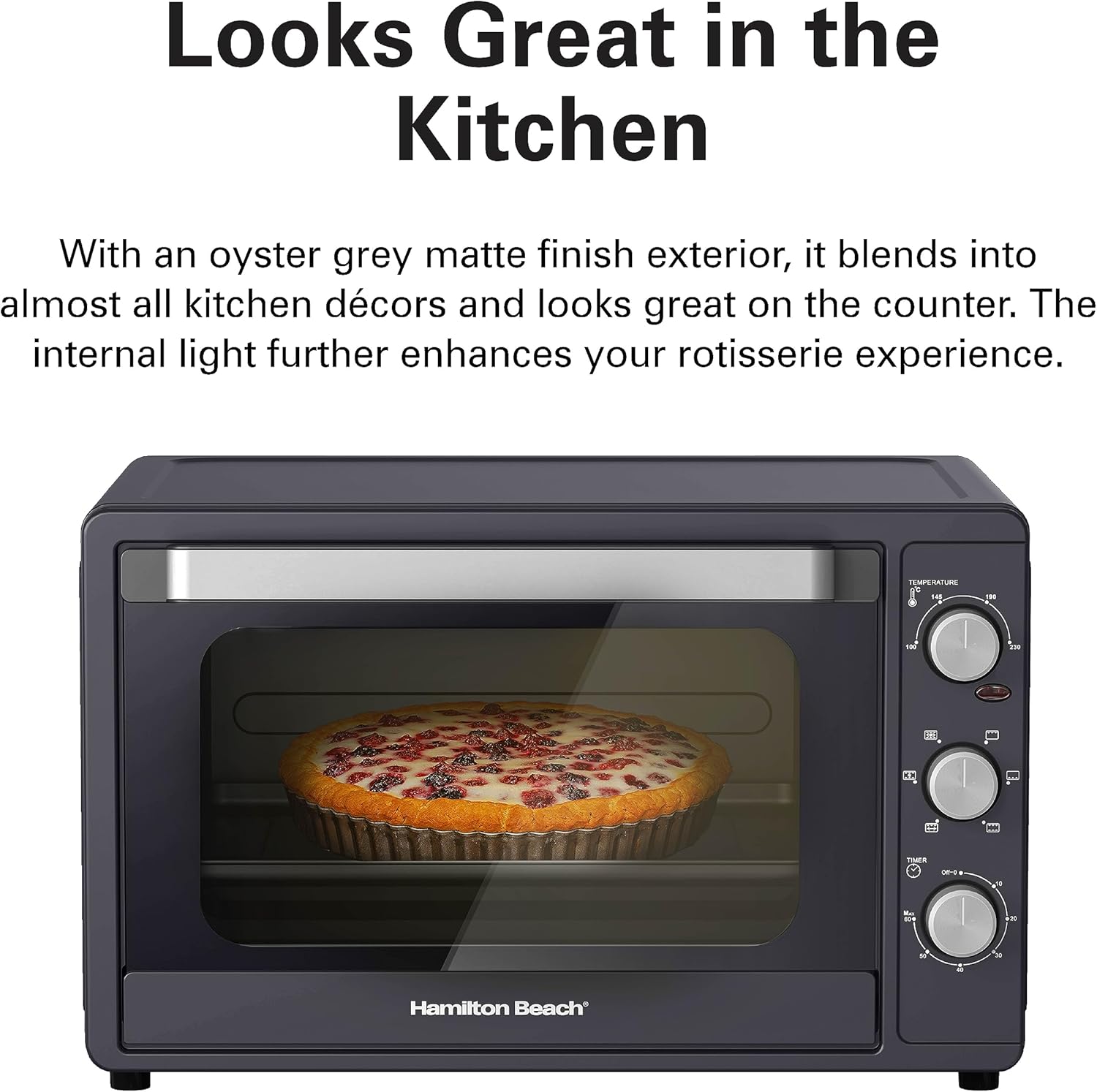 Hamilton Beach toaster oven baking a pie, showing internal light