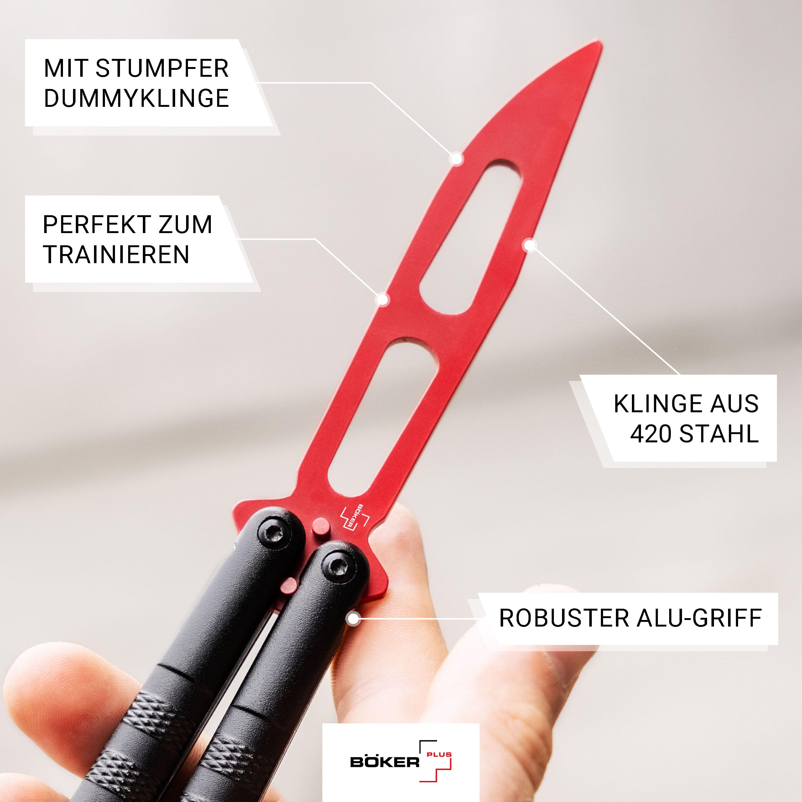 Böker PLUS® Relack Trainer – legales Balisong Trainingsmesser mit schwarzem Alu-Griff - Übungs-Messer mit roter Dummy Klinge ungeschärft - hochwertiges Butterfly Trainer Messer