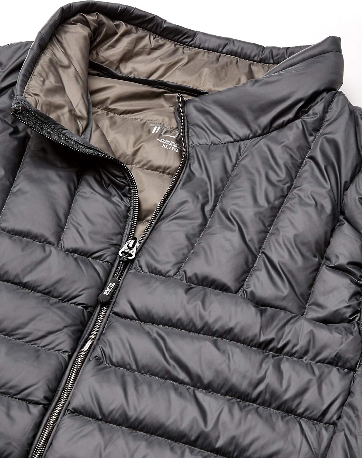 tumi puffer vest