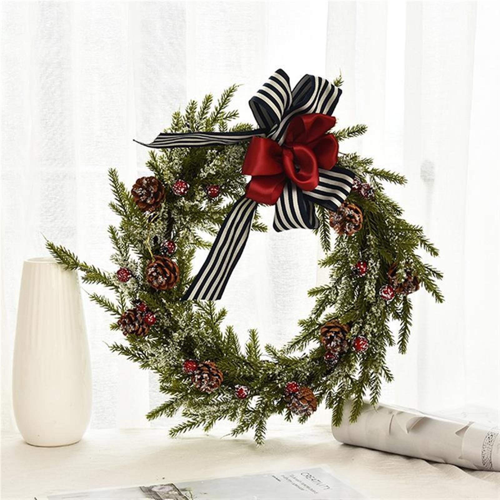 Couronne de Noël pour porte suspendue et ambiance festive