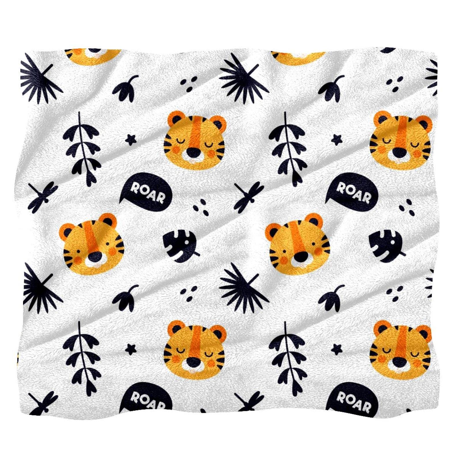 Couverture polaire tigre pour cocooner sur le canapé le soir